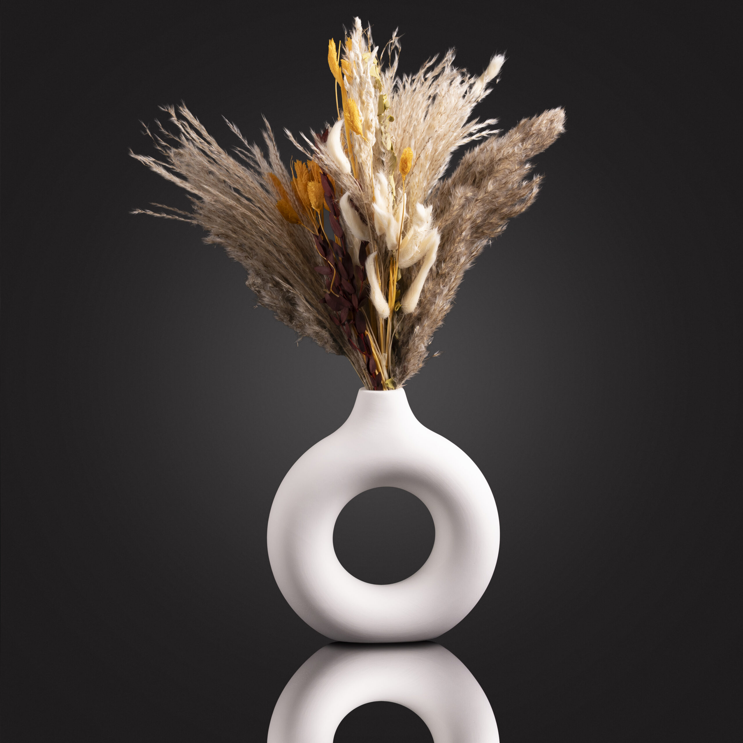 Oval Vase With Floral Arrangement